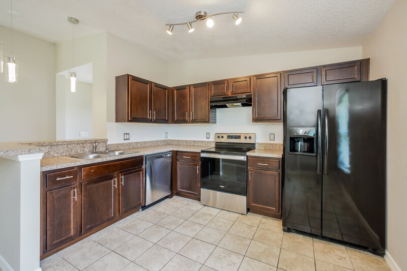 3,250/Mo, 7124 Holly Creek Rd Mount Dora, FL 32757 Kitchen View 2