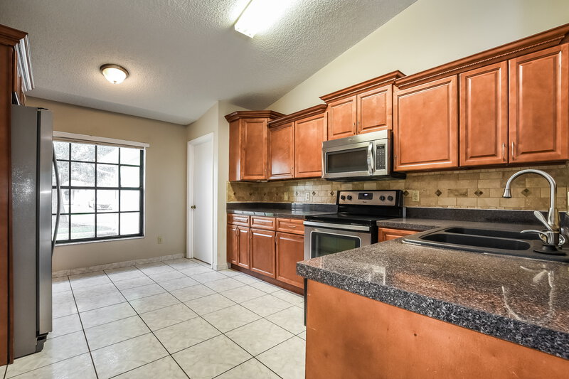 2,045/Mo, 2711 Ashley Ct Kissimmee, FL 34743 Kitchen View 2