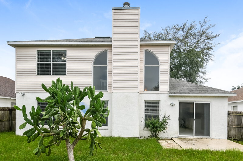 2,550/Mo, 1027 Woodsong Way Clermont, FL 34714 Rear View