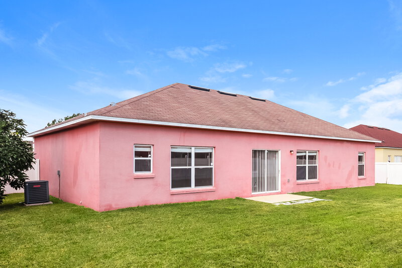 2,300/Mo, 2734 Woodstream Cir Kissimmee, FL 34743 Rear View 2