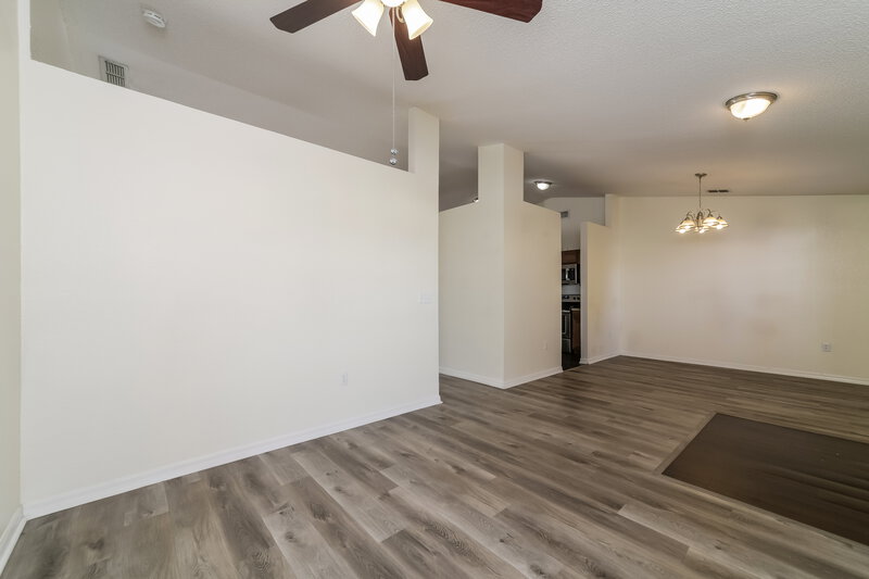 1,860/Mo, 7172 Summit Dr Winter Haven, FL 33884 Living Room View 2