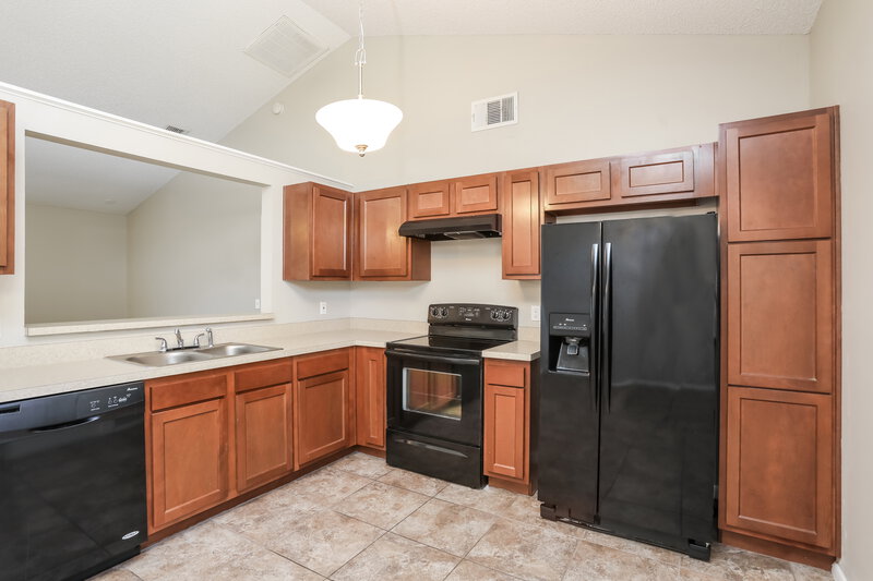 2,015/Mo, 5433 Red Bone Ln Orlando, FL 32810 Kitchen View 2
