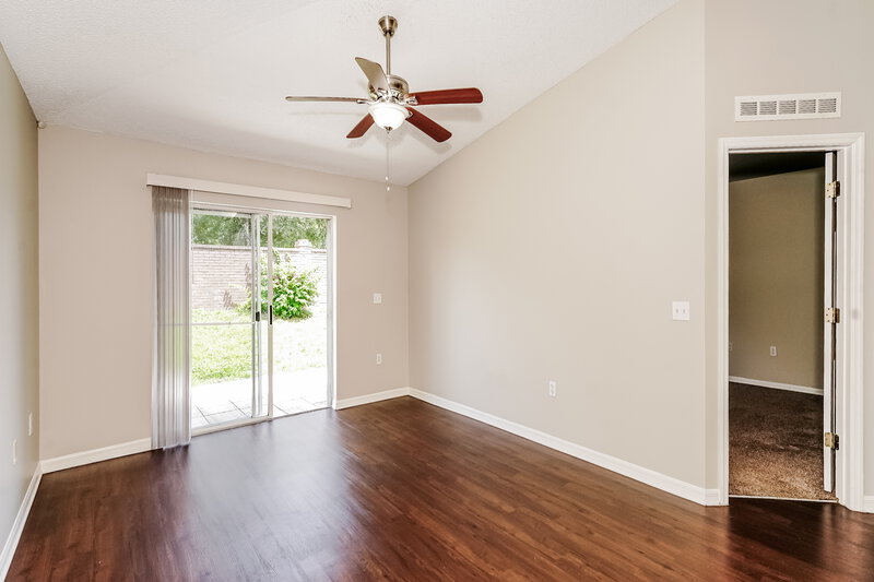 2,240/Mo, 14231 Econ Woods Ln Orlando, FL 32826 Family Room View