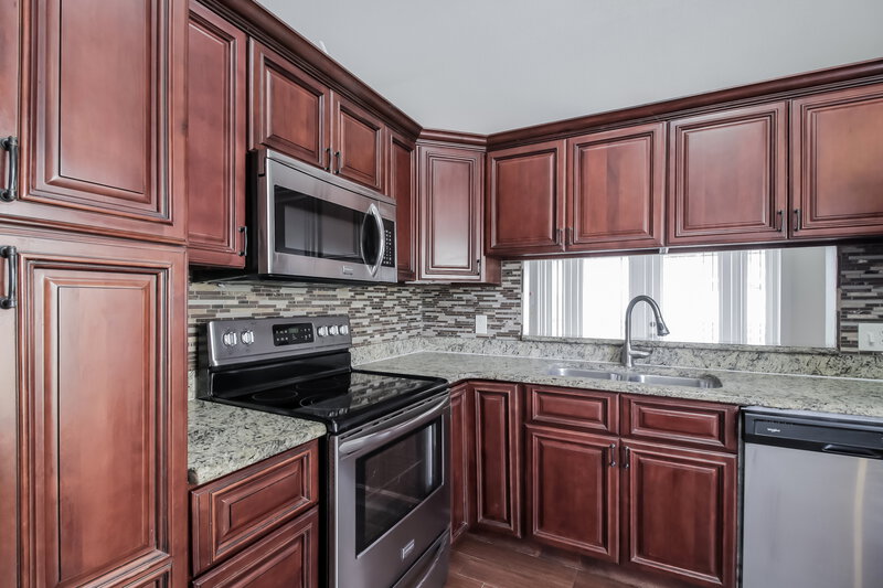 2,600/Mo, 10064 Marguex Dr Orlando, FL 32825 Kitchen View