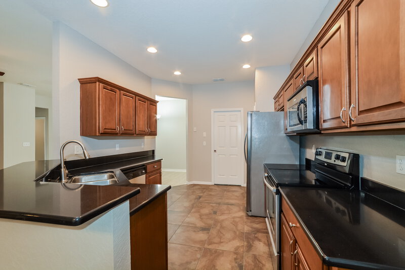 1,965/Mo, 7012 Brenton Manor Ln Winter Haven, FL 33881 Kitchen View