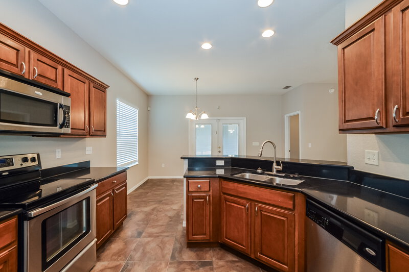 1,965/Mo, 7012 Brenton Manor Ln Winter Haven, FL 33881 Kitchen View 2