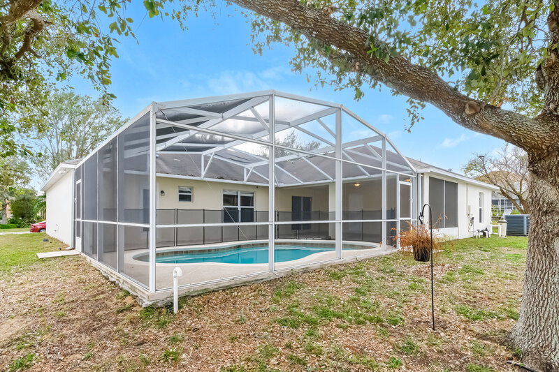 2,500/Mo, 3321 White Blossom Ln Clermont, FL 34711 Rear View