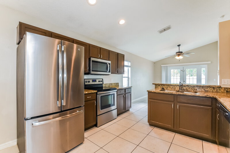 2,495/Mo, 11001 Siting Pl Orlando, FL 32825 Kitchen View 2