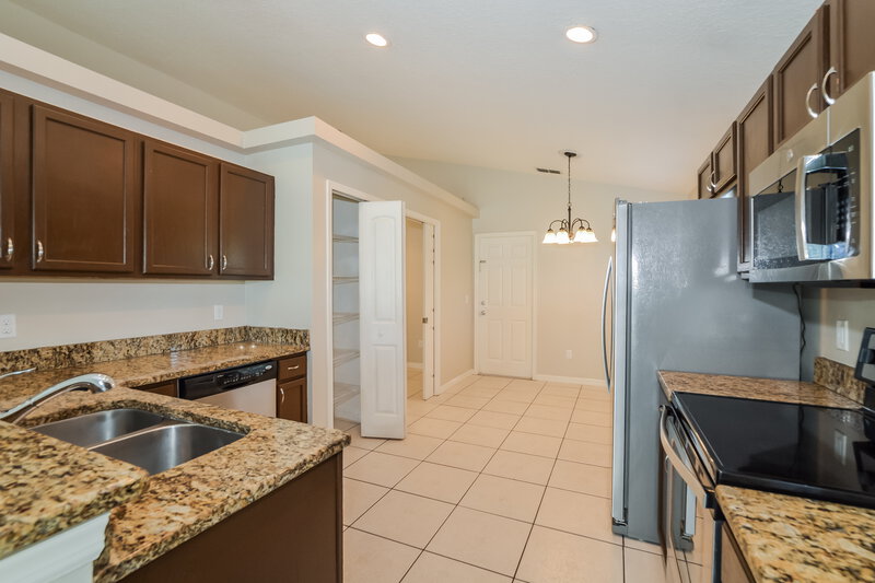 2,690/Mo, 11001 Siting Pl Orlando, FL 32825 Kitchen View