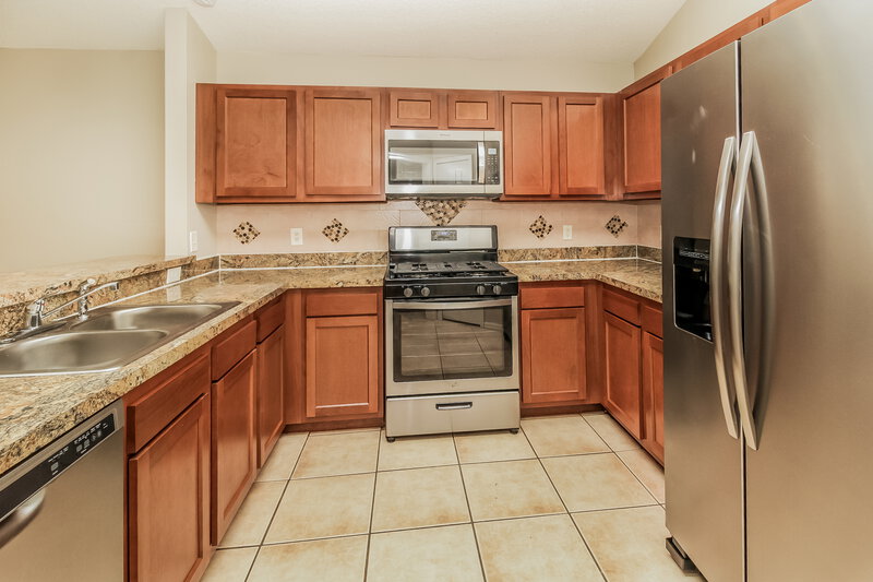 1,820/Mo, 13083 Odyssey Lake Way Orlando, FL 32826 Kitchen View