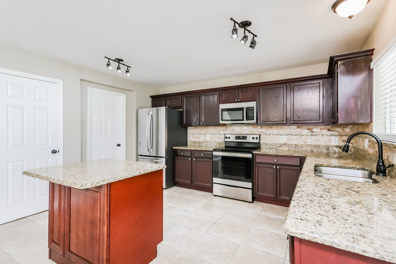 2,475/Mo, 4705 Willoughby St Kissimmee, FL 34758 Kitchen View 2