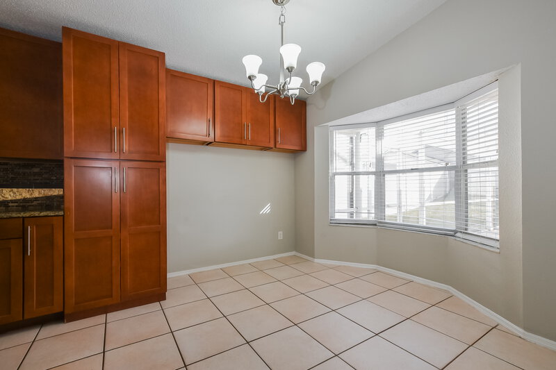 2,035/Mo, 8669 Wellington Loop Kissimmee, FL 34747 Dining Room View 2