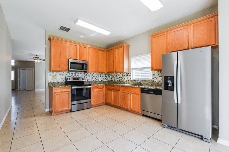 2,560/Mo, 322 Fieldstream West Blvd Orlando, FL 32825 Kitchen View