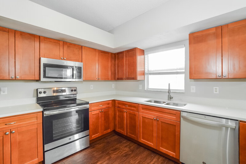 2,235/Mo, 14280 Rensselaer Rd Orlando, FL 32826 Kitchen View