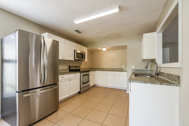 2,000/Mo, 9801 Red Clover Avenue Orlando, FL 32824 Kitchen View
