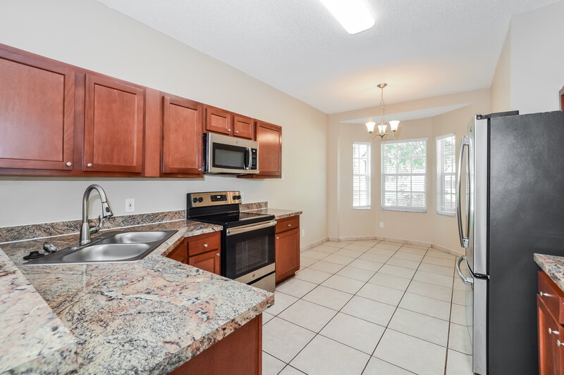 2,330/Mo, 4059 Boca Woods Dr Orlando, FL 32826 Kitchen View