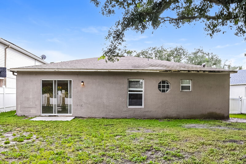 2,470/Mo, 12503 Woodbury Cove Dr Orlando, FL 32828 Rear View