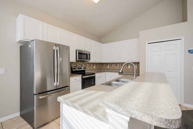 3,360/Mo, 1024 Whirlaway Dr Kissimmee, FL 34744 Kitchen View 2