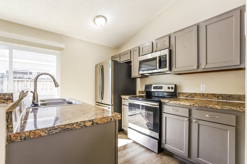 2,100/Mo, 8639 Foley Dr Orlando, FL 32825 Kitchen View