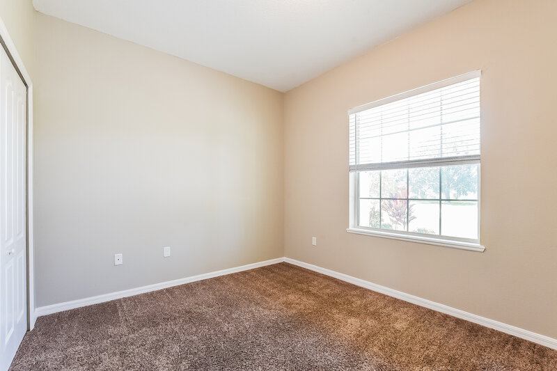 1,960/Mo, 4831 Petal Pawpaw Ln Saint Cloud, FL 34772 Bedroom View