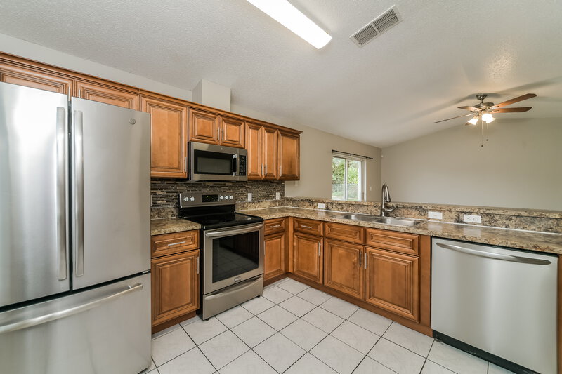 1,735/Mo, 1323 Dover Dr Kissimmee, FL 34758 Kitchen View 2