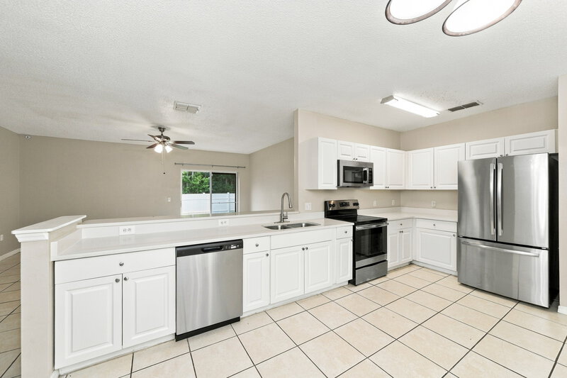 1,805/Mo, 1005 Dudley Dr Kissimmee, FL 34758 Kitchen View 2