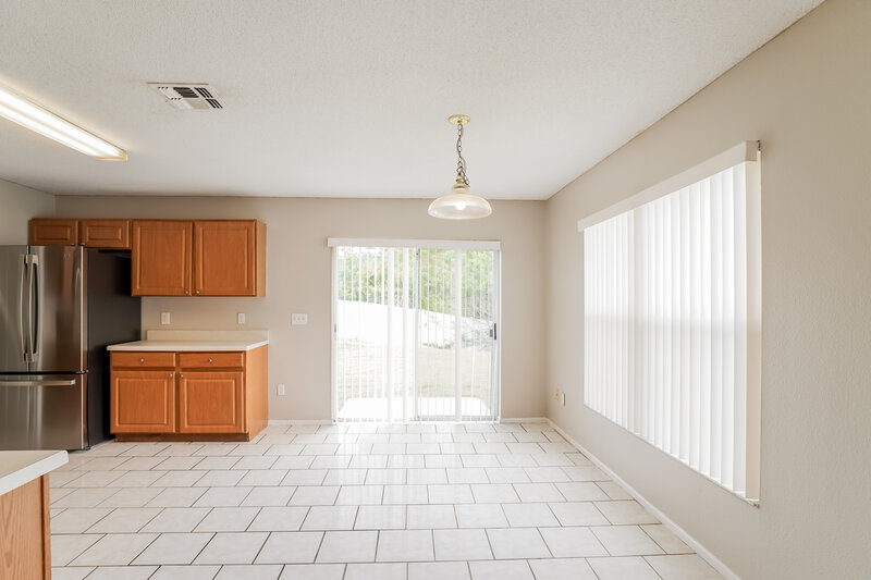 2,345/Mo, 13038 Prairie Meadows Dr Orlando, FL 32837 Dining Room View