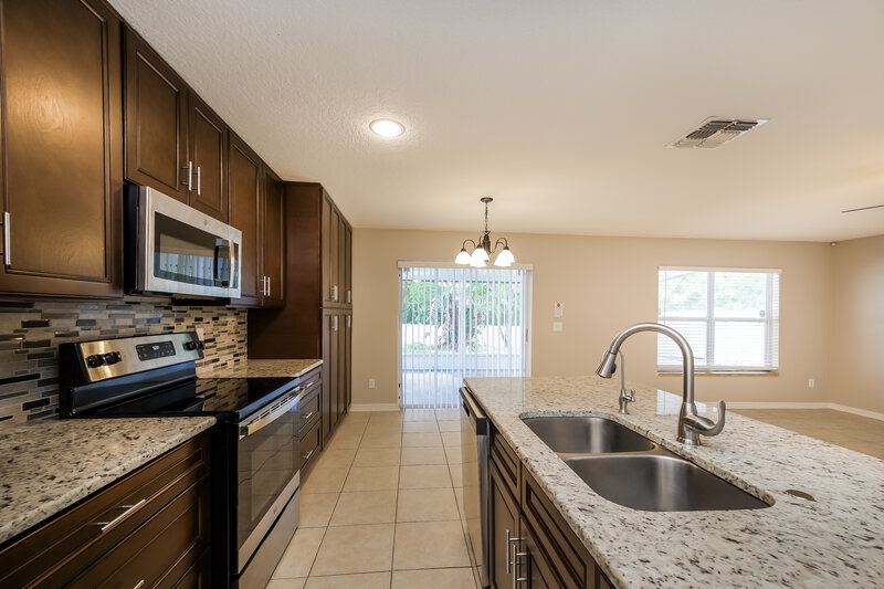 2,455/Mo, 2316 Stone Abbey Blvd Orlando, FL 32828 Kitchen View