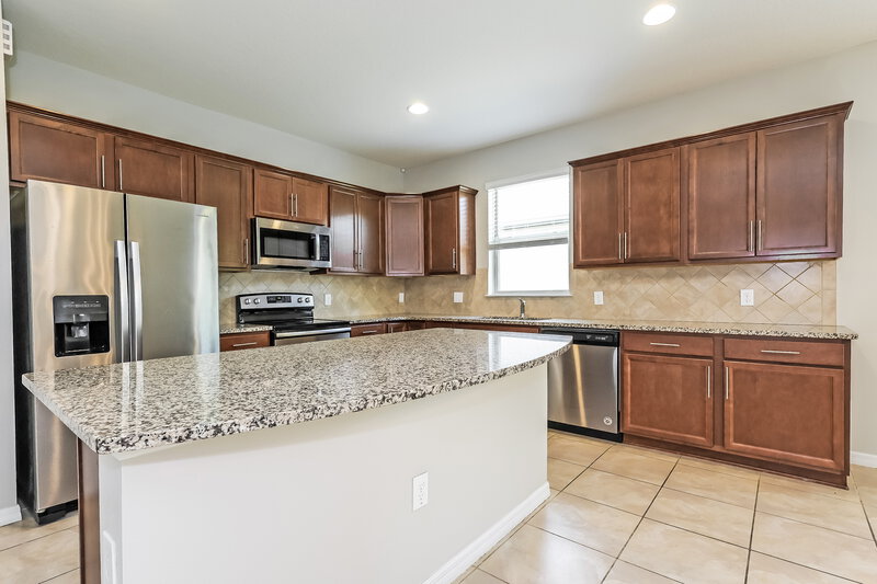 2,445/Mo, 3615 Vega Creek Dr Saint Cloud, FL 34772 Kitchen View 3
