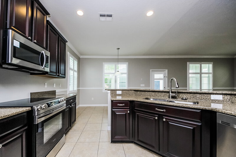 2,545/Mo, 6822 Butterfly Dr Harmony, FL 34773 Kitchen View 2