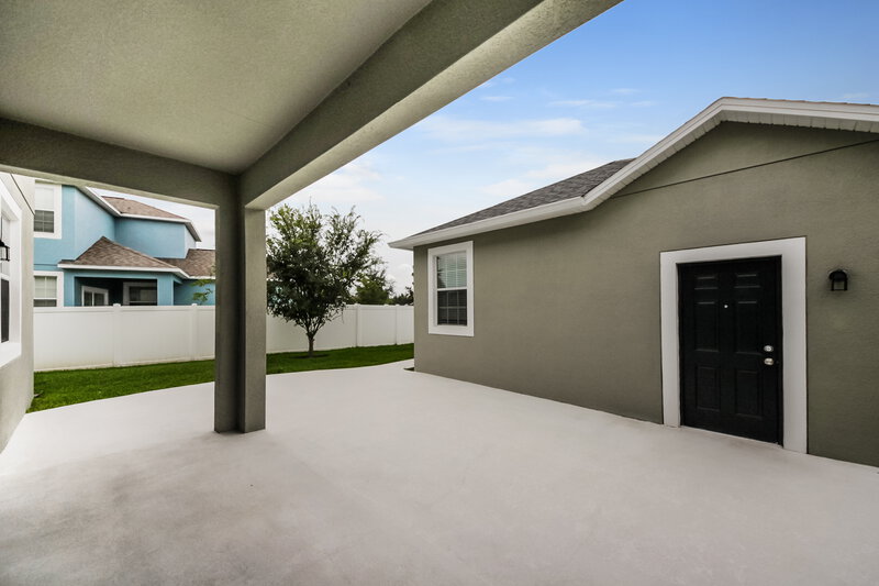 2,545/Mo, 6822 Butterfly Dr Harmony, FL 34773 Covered Patio View