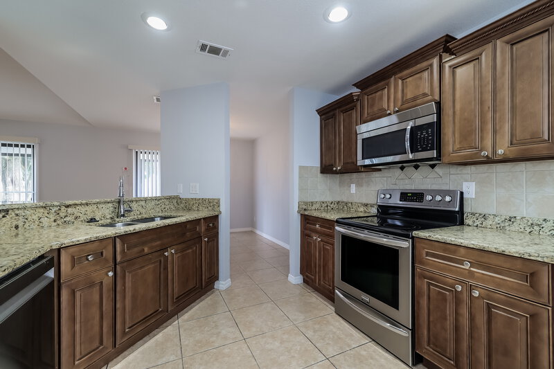1,975/Mo, 652 N Delmonte Ct Kissimmee, FL 34758 Kitchen View 2