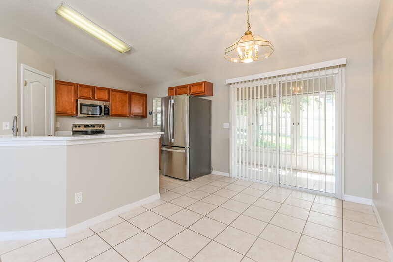 1,975/Mo, 713 Gentle Breeze Dr Minneola, FL 34715 Dining Room View