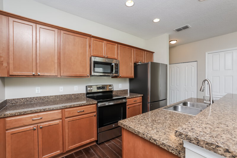 2,065/Mo, 5117 Ballark St Mount Dora, FL 32757 Kitchen View 2