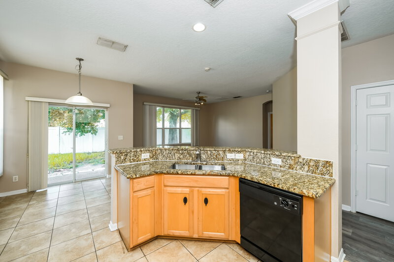 2,375/Mo, 7526 Bear Claw Run Orlando, FL 32825 Kitchen View 2
