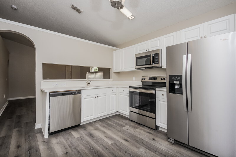 2,810/Mo, 5618 New Cambridge Rd Orlando, FL 32810 Kitchen View