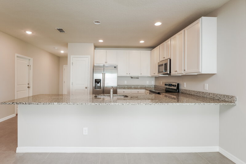 2,590/Mo, 1042 Dudley Dr Kissimmee, FL 34758 Kitchen View 2