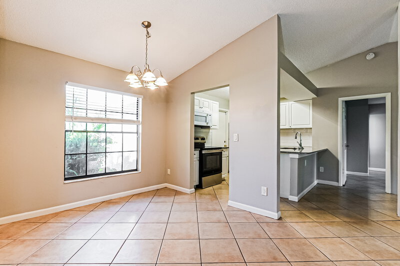 2,060/Mo, 8726 Gopher Ln Orlando, FL 32829 Dining Room View
