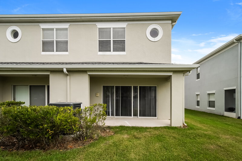 2,170/Mo, 9394 FLOWERING COTTONWOOD RD Unit 58 Orlando, FL 32832 Rear View