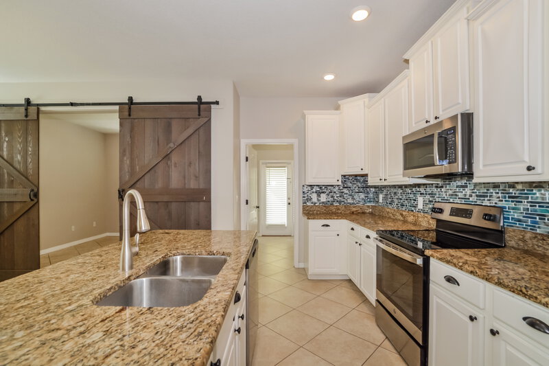 3,320/Mo, 6817 Sundrop St Harmony, FL 34773 Kitchen View