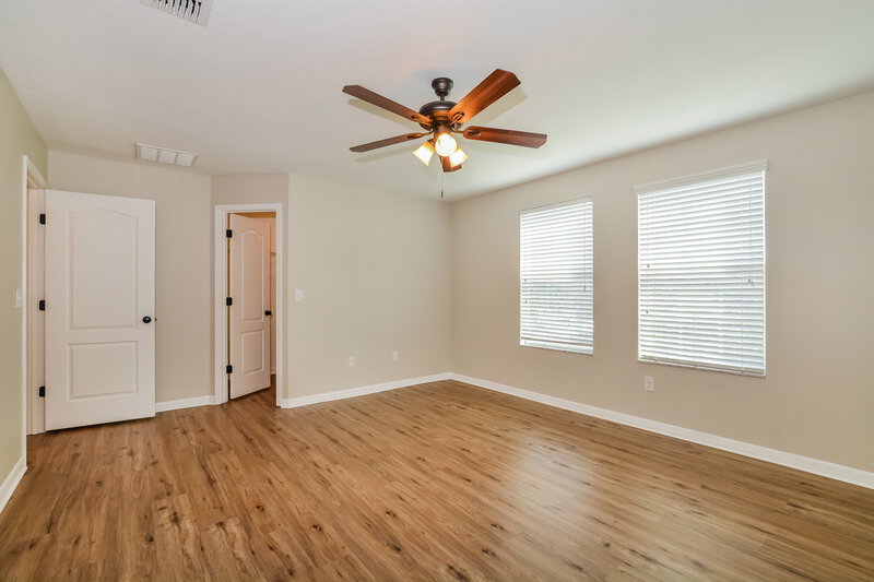 3,320/Mo, 6817 Sundrop St Harmony, FL 34773 Main Bedroom View