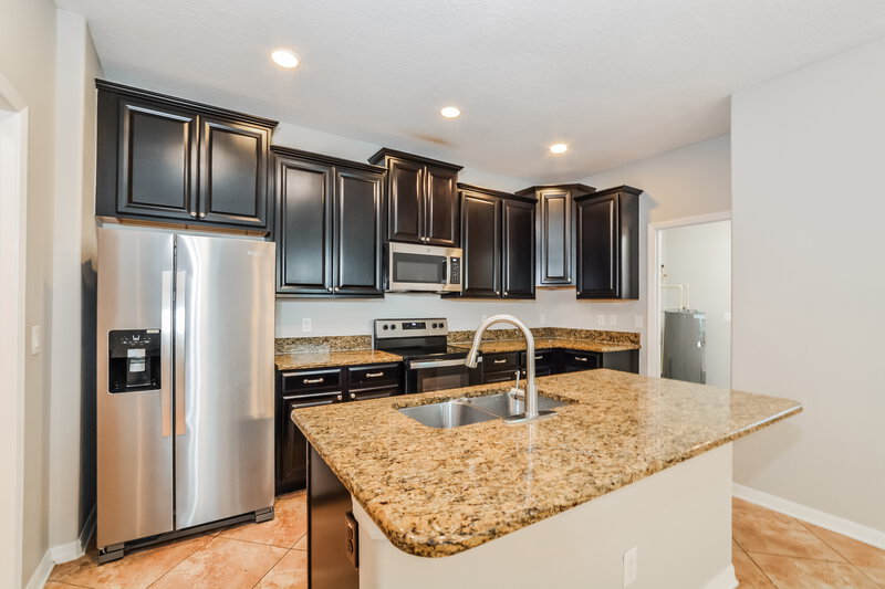 2,040/Mo, 6842 Little Blue Ln Harmony, FL 34773 Kitchen View