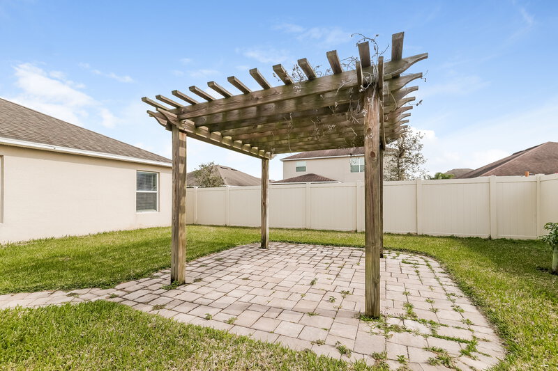 2,500/Mo, 1438 Sawgrass Pointe Dr Orlando, FL 32824 Rear View 2