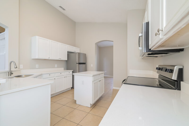 2,290/Mo, 4469 Cherry Branch Ct Kissimmee, FL 34758 Kitchen View 2
