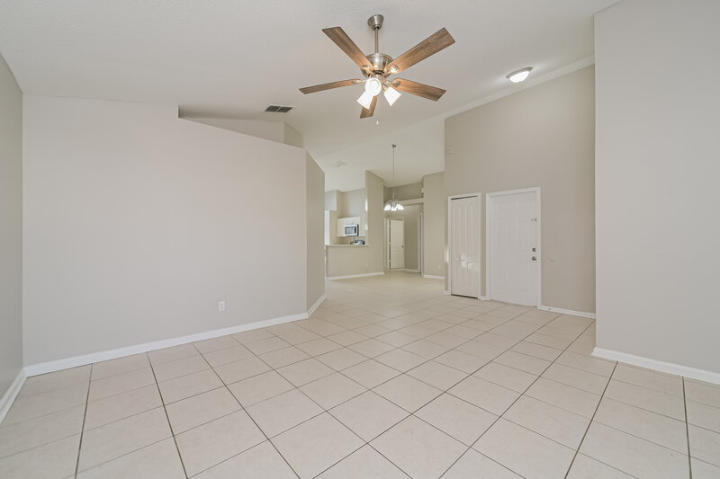 2,365/Mo, 6859 Bouganvillea Crescent Dr Orlando, FL 32809 Living Room View 2