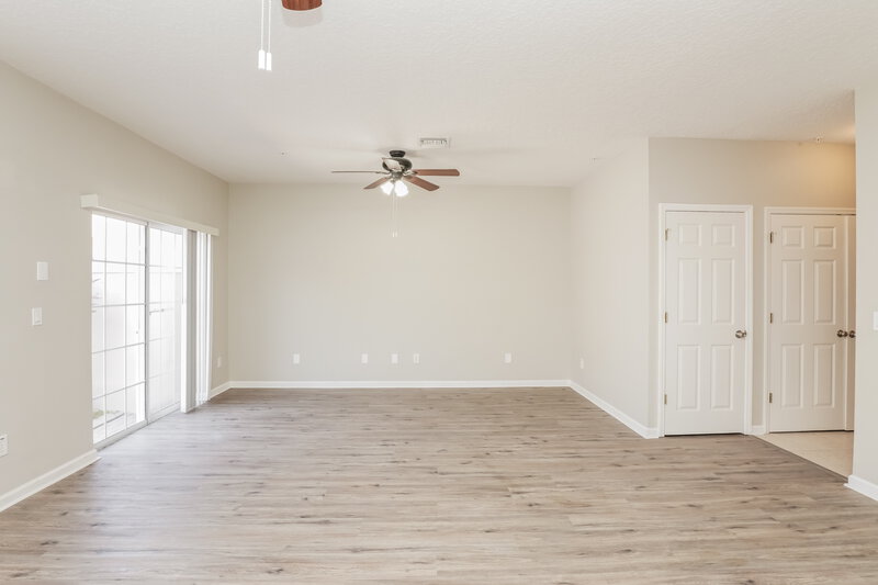 3,740/Mo, 8749 Silk Bay Pl Orlando, FL 32827 Living Room View 2