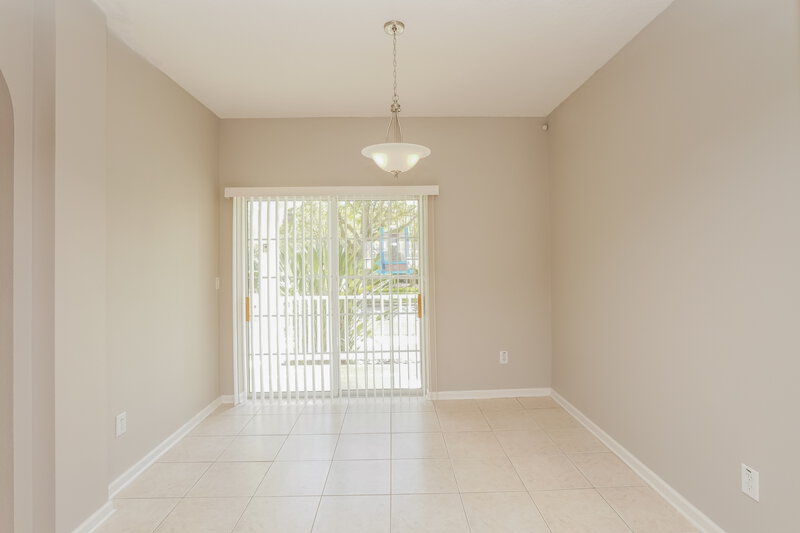 3,740/Mo, 8749 Silk Bay Pl Orlando, FL 32827 Dining Room View