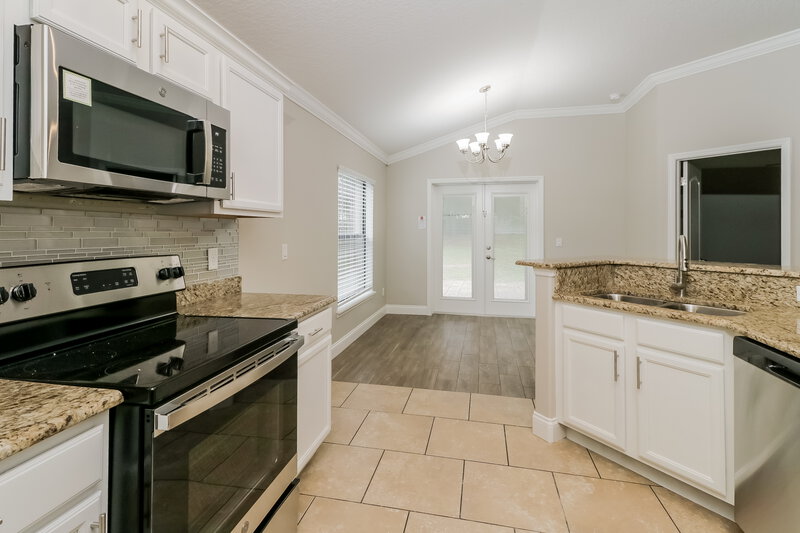 3,920/Mo, 2236 Bracknell Forest Trl Tavares, FL 32778 Kitchen View 2