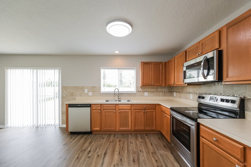 2,605/Mo, 4703 Hardy Mills St Kissimmee, FL 34758 Kitchen View 2