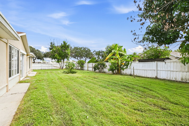 2,260/Mo, 2702 Woodstream Cir Kissimmee, FL 34743 Backyard View